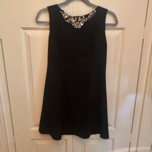 Black dress with beaded neckline